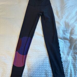 Peloton Black Leggings with Purple Accents / ** Reversible